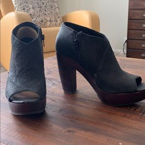 Women’s black booties.